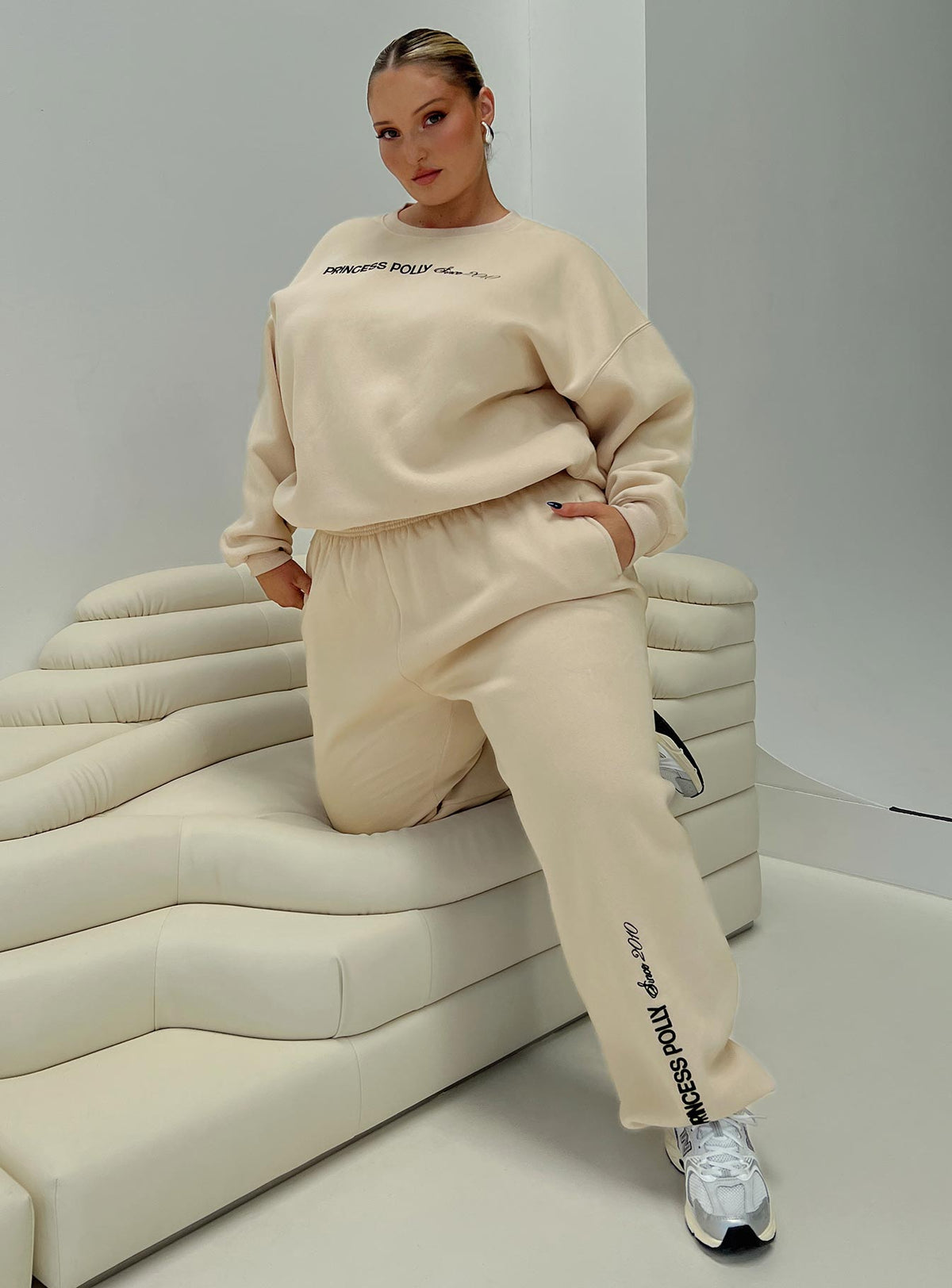 front view of model wearing Princess Polly Princess Polly Crew Neck Sweatshirt Block / Cursive Text Stone Curve regular Jumpers 
