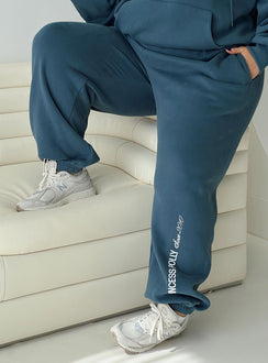 back view of model wearing Princess Polly Princess Polly Track Pants Block / Cursive Text Slate Curve Pants 