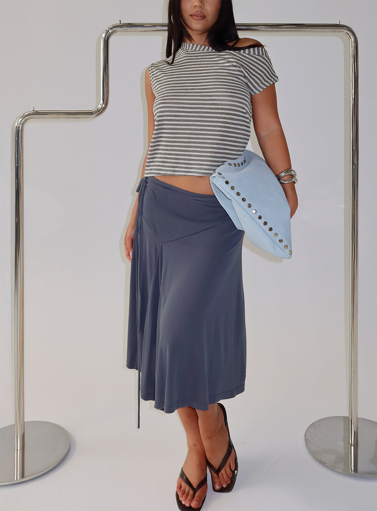   front view of model wearing Princess Polly Joaney Tie Side Jersey Midi Skirt Slate Midi Skirts 