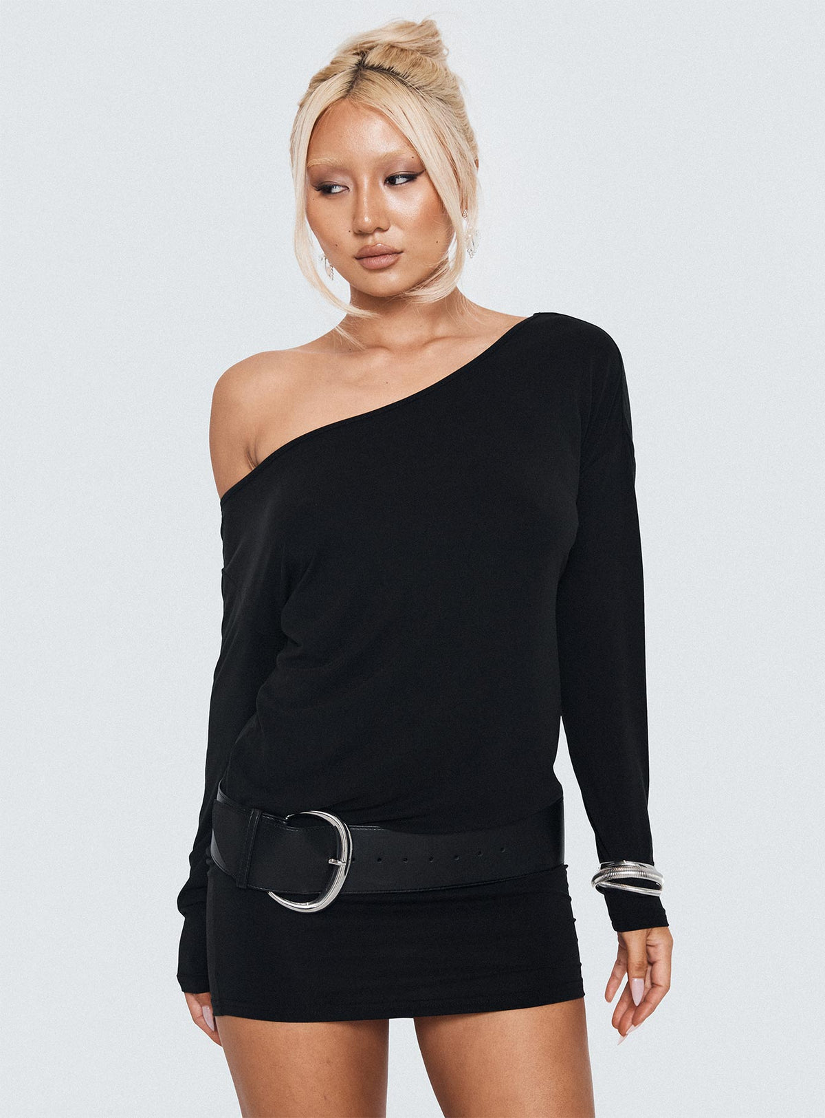 front view of model wearing Princess Polly Shelisa Mini Dress Black Asymmetric Neckline 