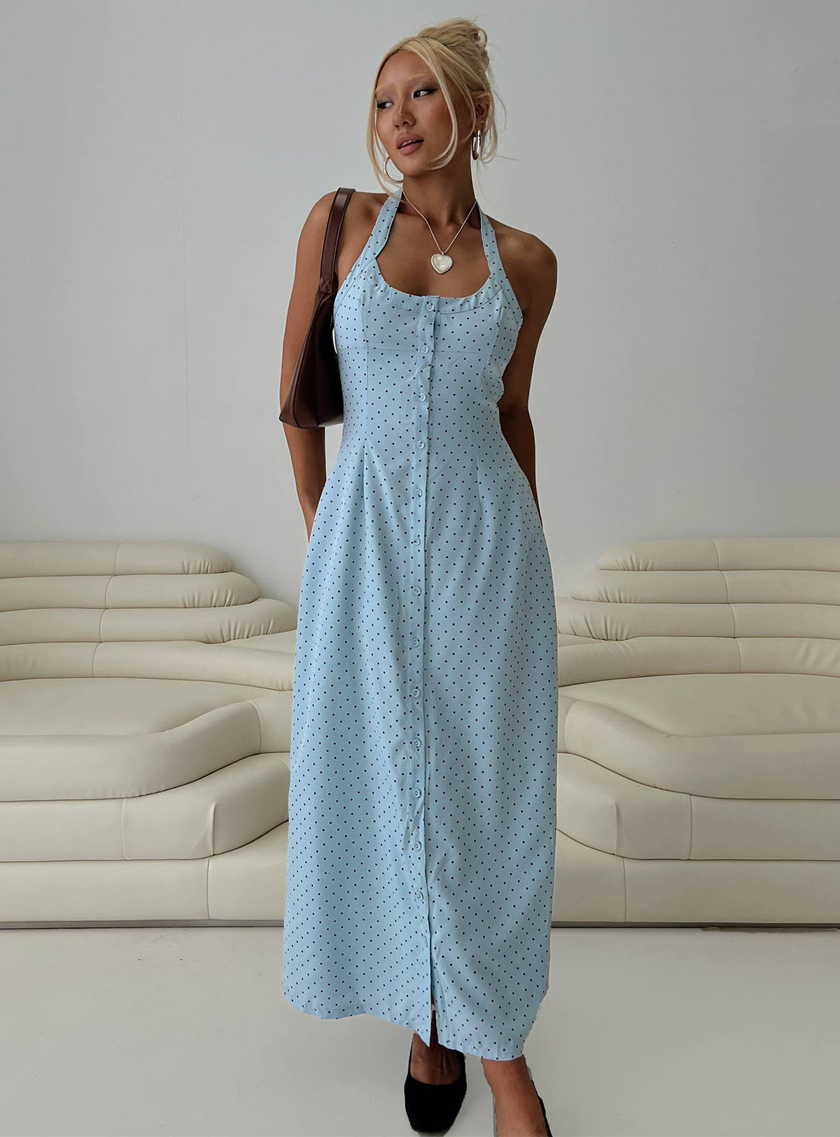 front view of model wearing Princess Polly Mallorie Halter Maxi Dress Blue / Black Polka Scoop Neck 