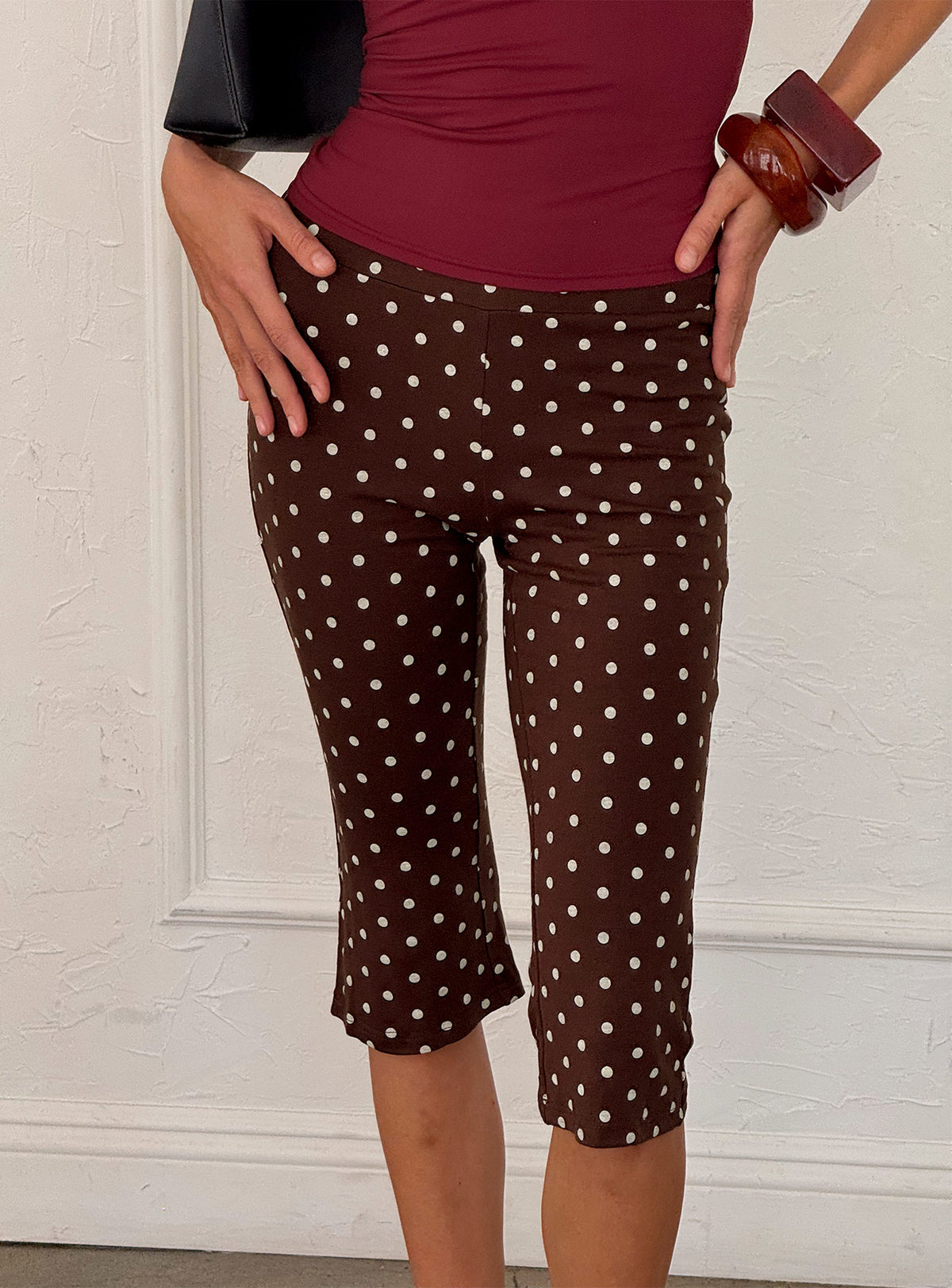 back view of model wearing Princess Polly Samaira Capri Pant Brown Polka Dot Mid Rise Pants Pants 