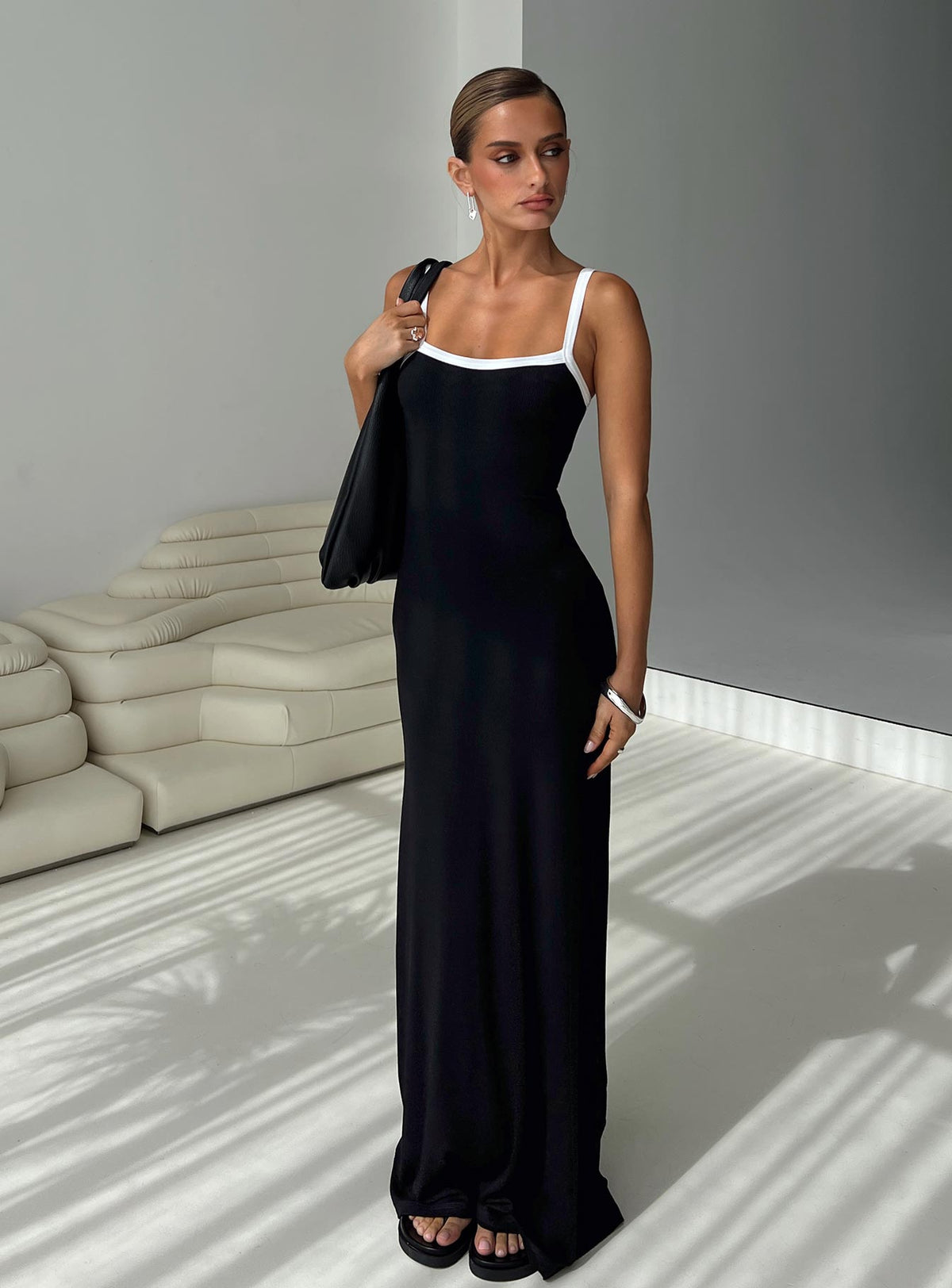 front view of model wearing Princess Polly Austrina Maxi Dress Black Square Neck 