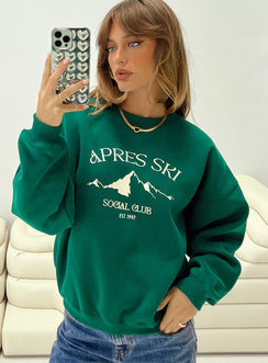 front view of model wearing Princess Polly Apres Ski Crew Neck Sweatshirt Green / Cream Jumpers 