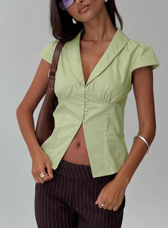 side view of model wearing Princess Polly Crowd Control Collared Top Sage Short Sleeves Plunger 