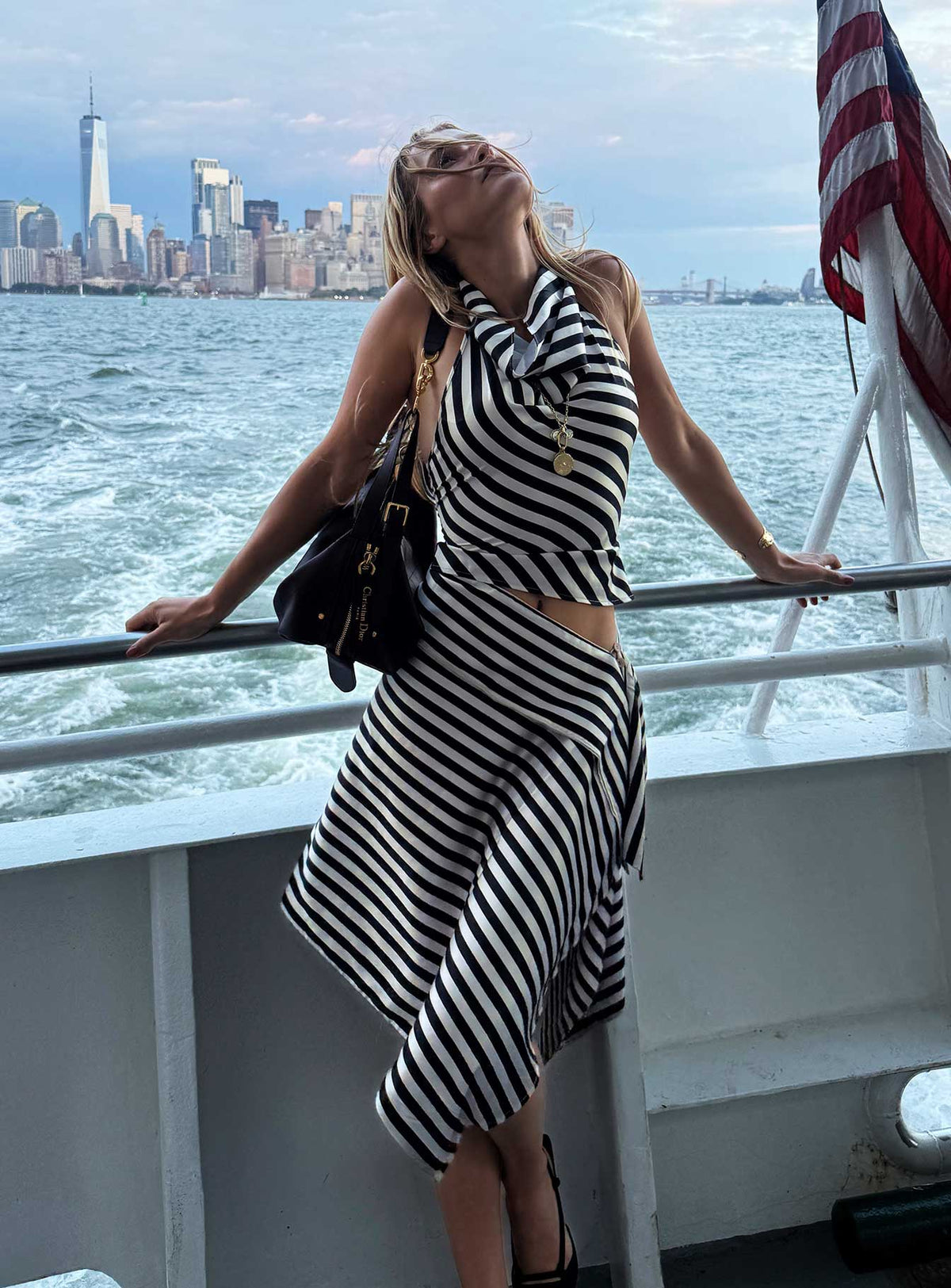 back view of model wearing Princess Polly Allure Midi Skirt Noir Stripe Midi Skirts Skirts 