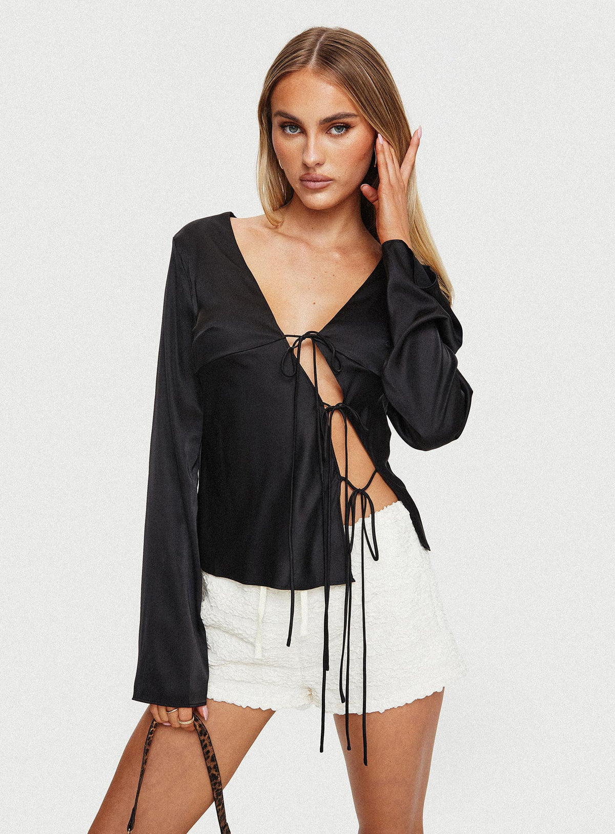 front view of model wearing Princess Polly Mariah Long Sleeve Top Black Full Sleeves Plunger 