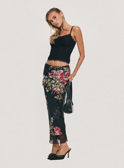   side view of model wearing Princess Polly Paganio Maxi Skirt Black Floral Maxi Skirts Skirts 