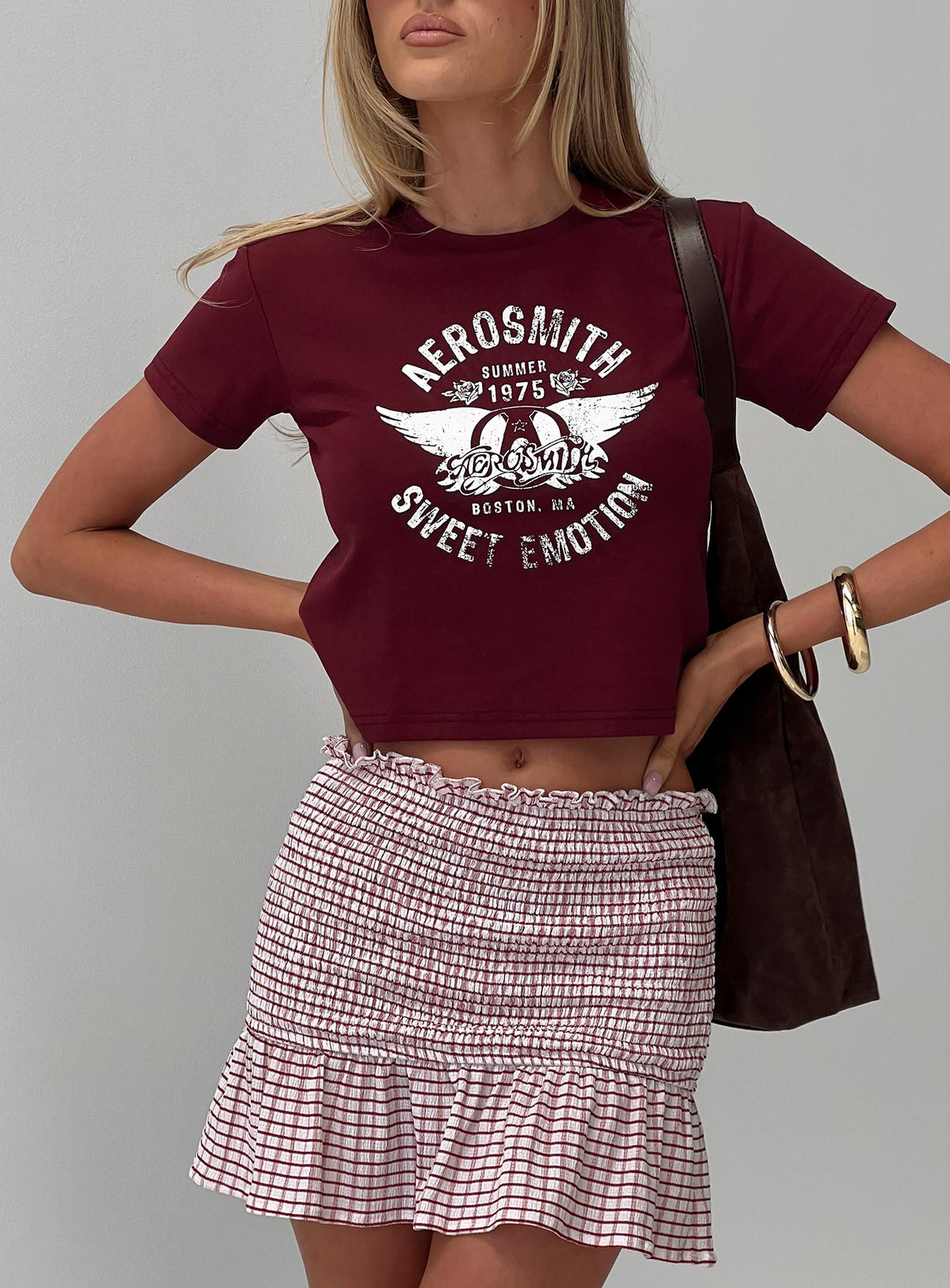 front view of model wearing Princess Polly Aerosmith Vintage Graphic Top Burgundy Short Sleeves Crew Neck 