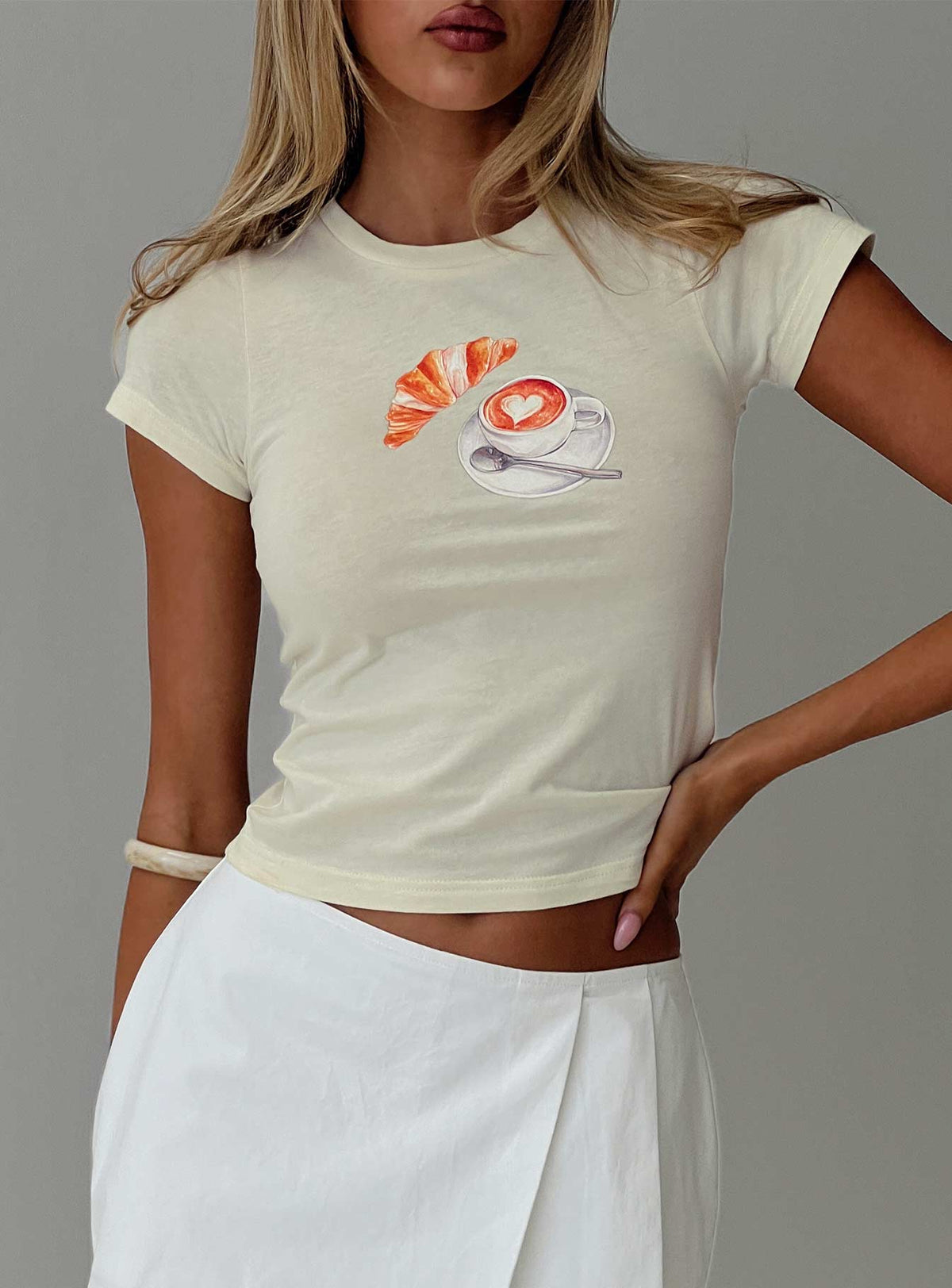 front view of model wearing Princess Polly Late Mornings Top Cream Short Sleeves Crew Neck 