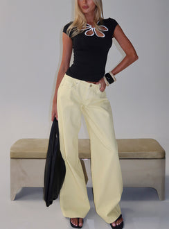 front view of model wearing Princess Polly Ramos Low Rise Wide Leg Denim Jeans Butter Lemon Low Rise Jeans Jeans 