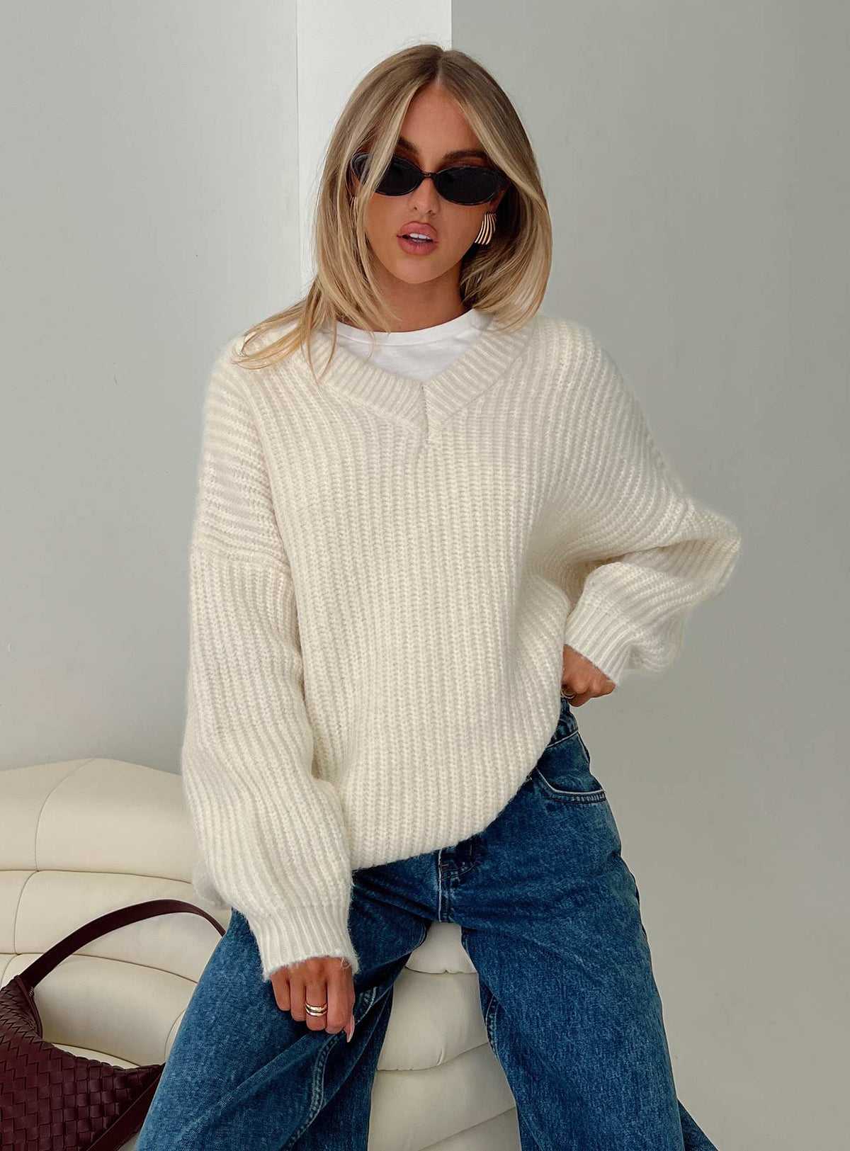 front view of model wearing Princess Polly Have It All V Neck Knit Sweater Cream Long 