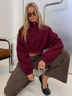 Featuring the Astridd 3/4 Zip Cropped Jumper Cherry womens-jumpers with short length detail view of model wearing Princess Polly