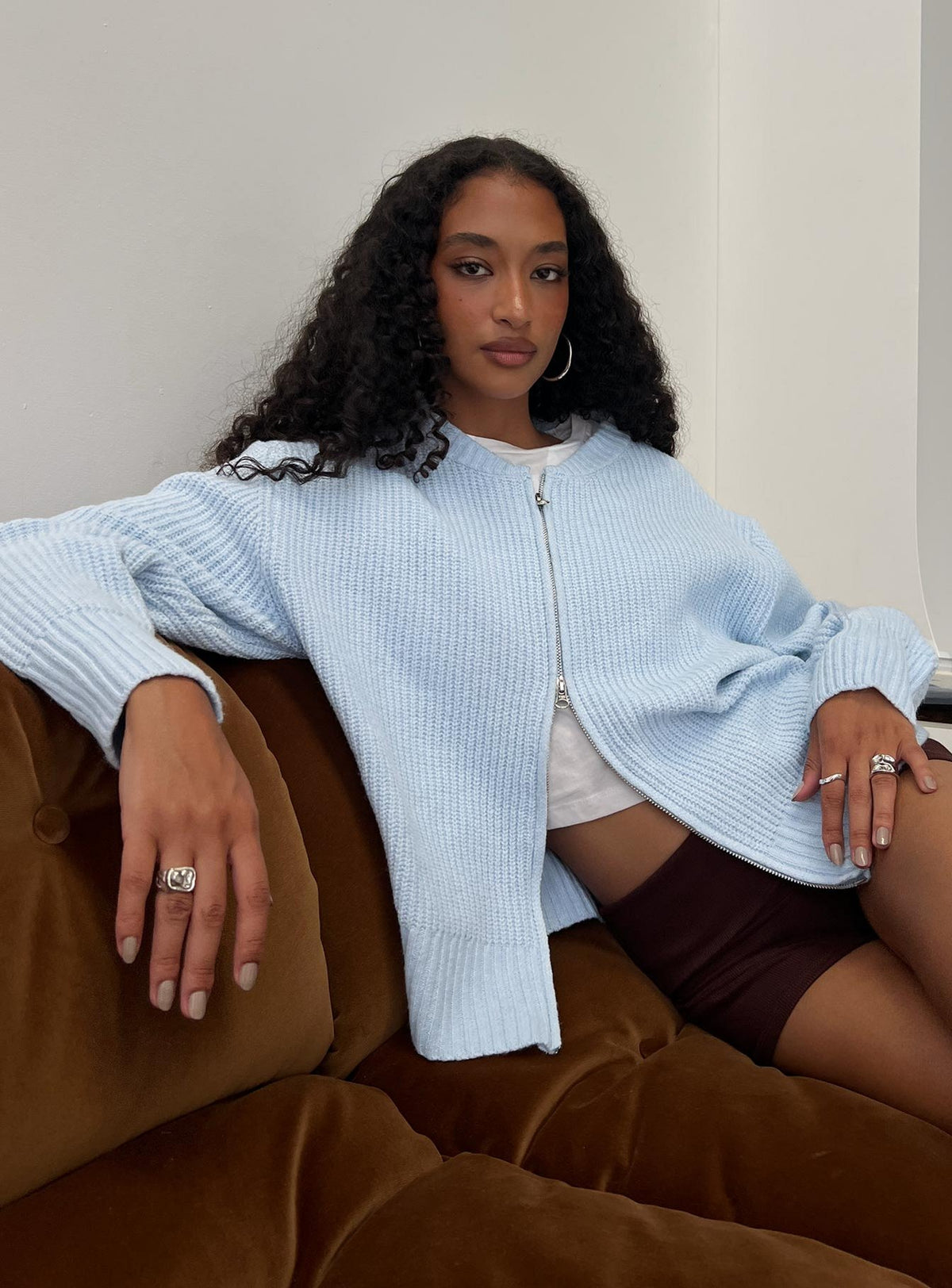 back view of model wearing Princess Polly Lexene Zip Through Jumper Baby Blue Longline Jumpers Jumpers 