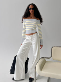 front view of model wearing Princess Polly Hereos Mid Rise Baggy Leg Jeans White Mid Rise Jeans Jeans 