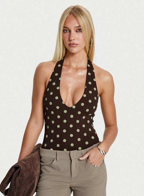 front view of model wearing Princess Polly Someone New Halter Bodysuit Chocolate Polka Sleeveless Bodysuit 