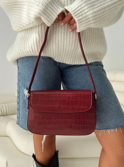 Faux croc leather shoulder bag Gold-toned hardware, zip and button fastening, internal zip & slip pockets, flat base