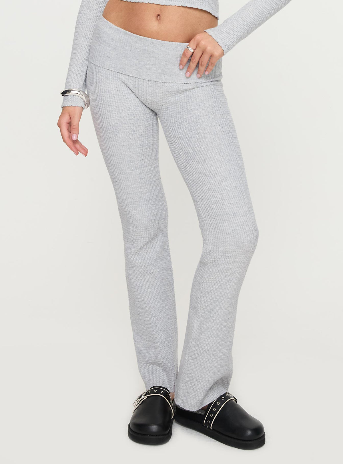 side view of model wearing Princess Polly Closed Eyes Flared Pant Grey Low Rise Pants Pants 