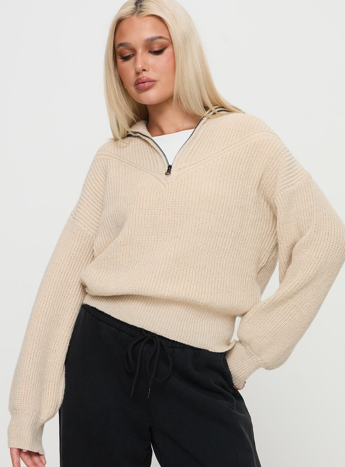 front view of model wearing Princess Polly Fireheart Zip Through Knit Sweater Beige Cropped Jumpers Jumpers 