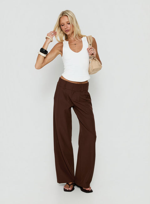 Featuring the Two Lovers Low Rise Pants Chocolate in womens regular pants with belt and wide-leg design detail view of model wearing