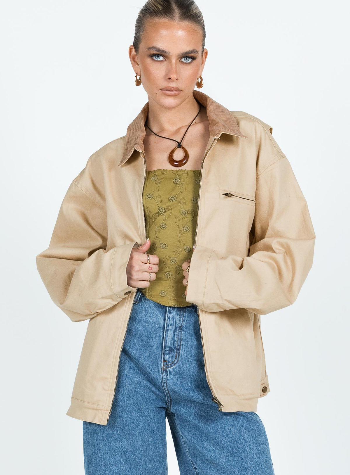 Jacket Corduroy classic collar Brass toned hardware Zip front fastening Twin hip pockets Snap button closure along cuffs Plaid lining