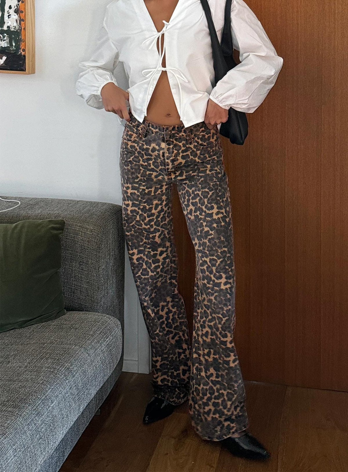 front view of model wearing Princess Polly Top Model Low Rise Straight Leg Jeans Leopard High Rise Jeans Jeans 