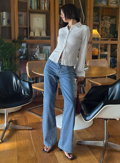 back view of model wearing Princess Polly Maryanne Mid Rise Relaxed Jeans Mid Wash Denim Tall Mid Rise Jeans Jeans 