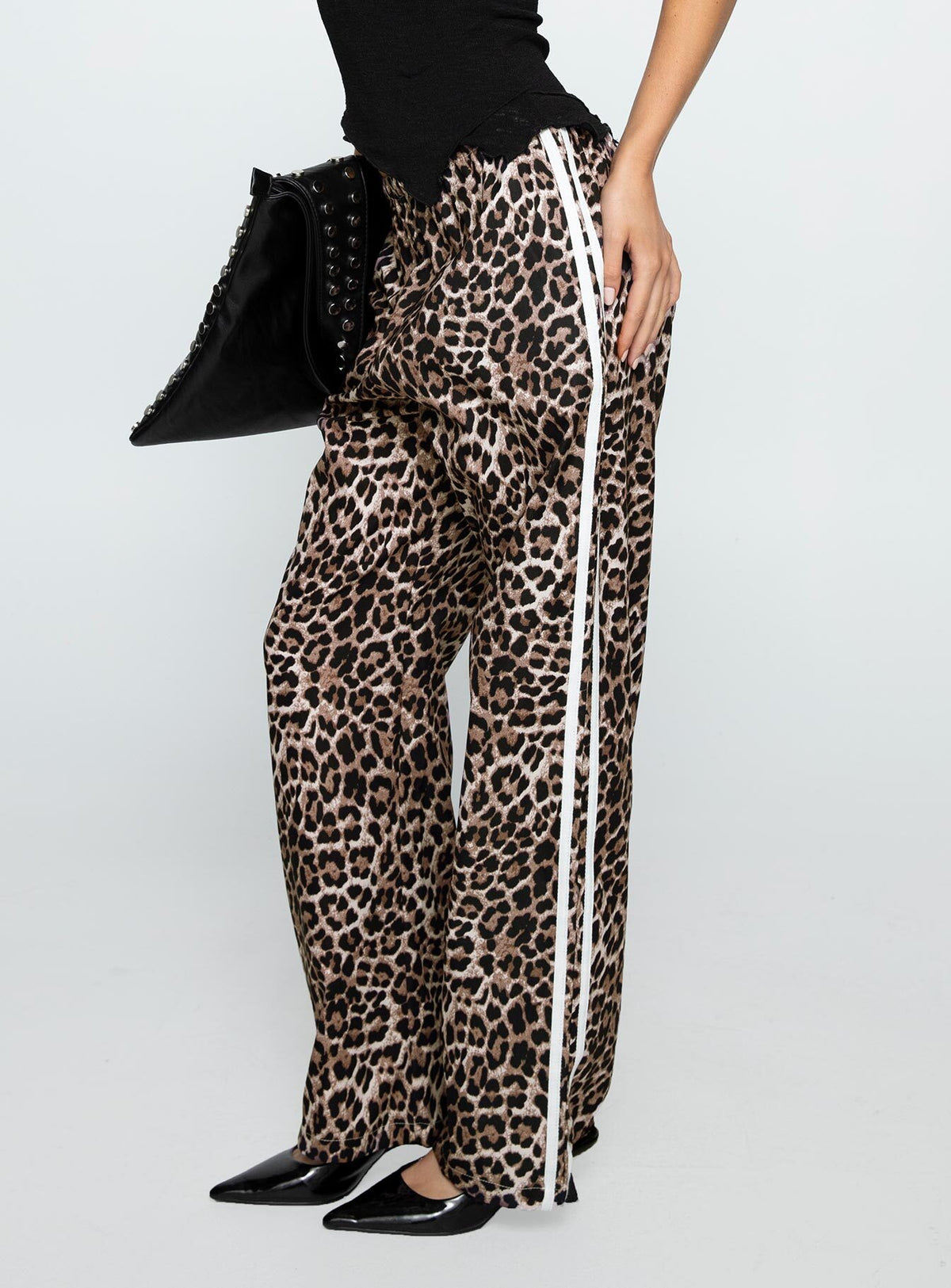 back view of model wearing Princess Polly Buzzer Track Pants Leopard High Rise Pants Pants 