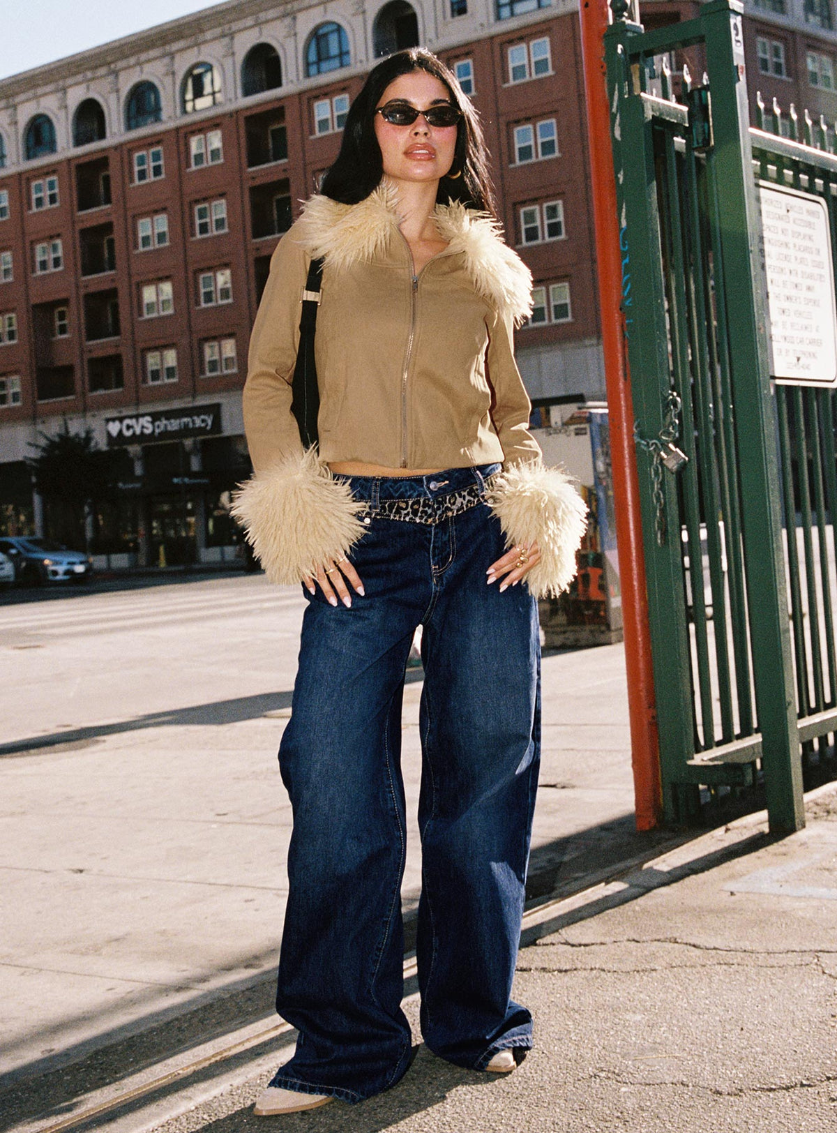 side view of model wearing Princess Polly Savenna Mid Rise Wide Leg Jeans Dark Wash / Leopard High Rise Jeans Jeans 