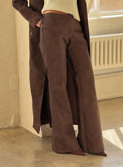 back view of model wearing Princess Polly Trickrider Tie Side Faux Leather Pants Chocolate Mid Rise Pants Pants 