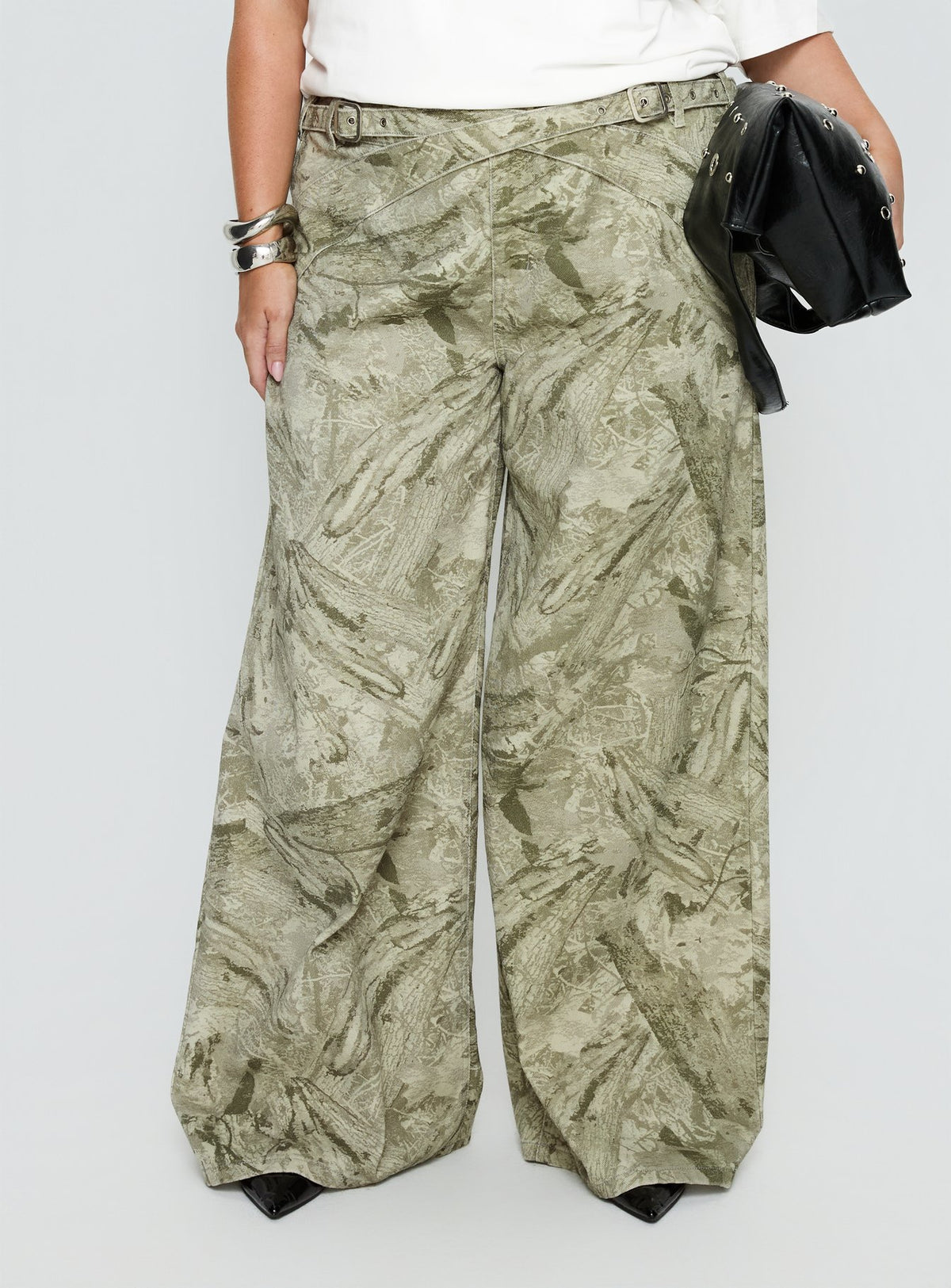 back view of model wearing Princess Polly Mckinley Mid Rise Wide Leg Jeans Camouflage Curve Mid Rise Jeans Jeans 