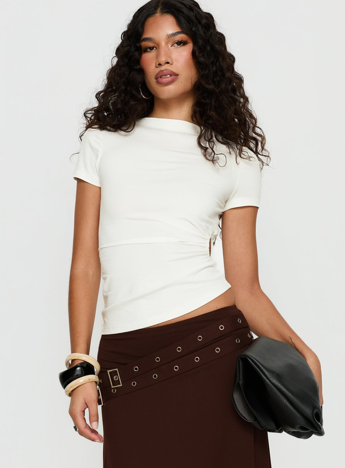   front view of model wearing Princess Polly Lorensa Double Buckle Asymmetrical Midi Skirt Brown Midi Skirts Skirts 