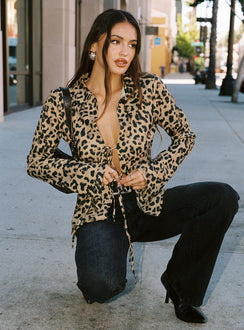 front view of model wearing Princess Polly Toriah Long Sleeve Tie Up Top Leopard Full Sleeves Plunger 