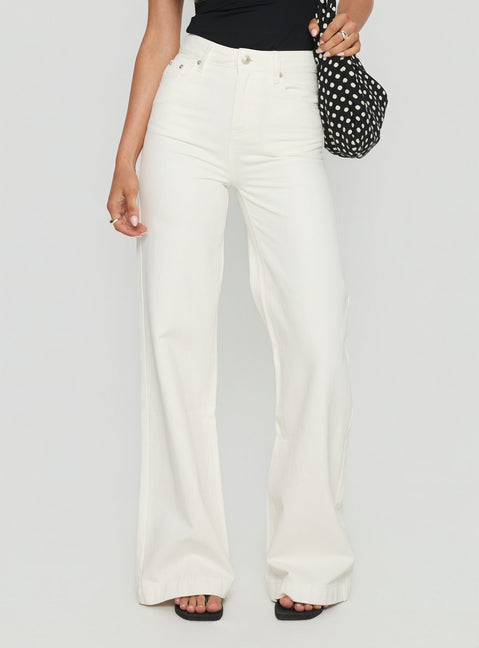 side view of model wearing Princess Polly Goldie High Rise Wide Leg Jeans White High Rise Jeans Jeans 