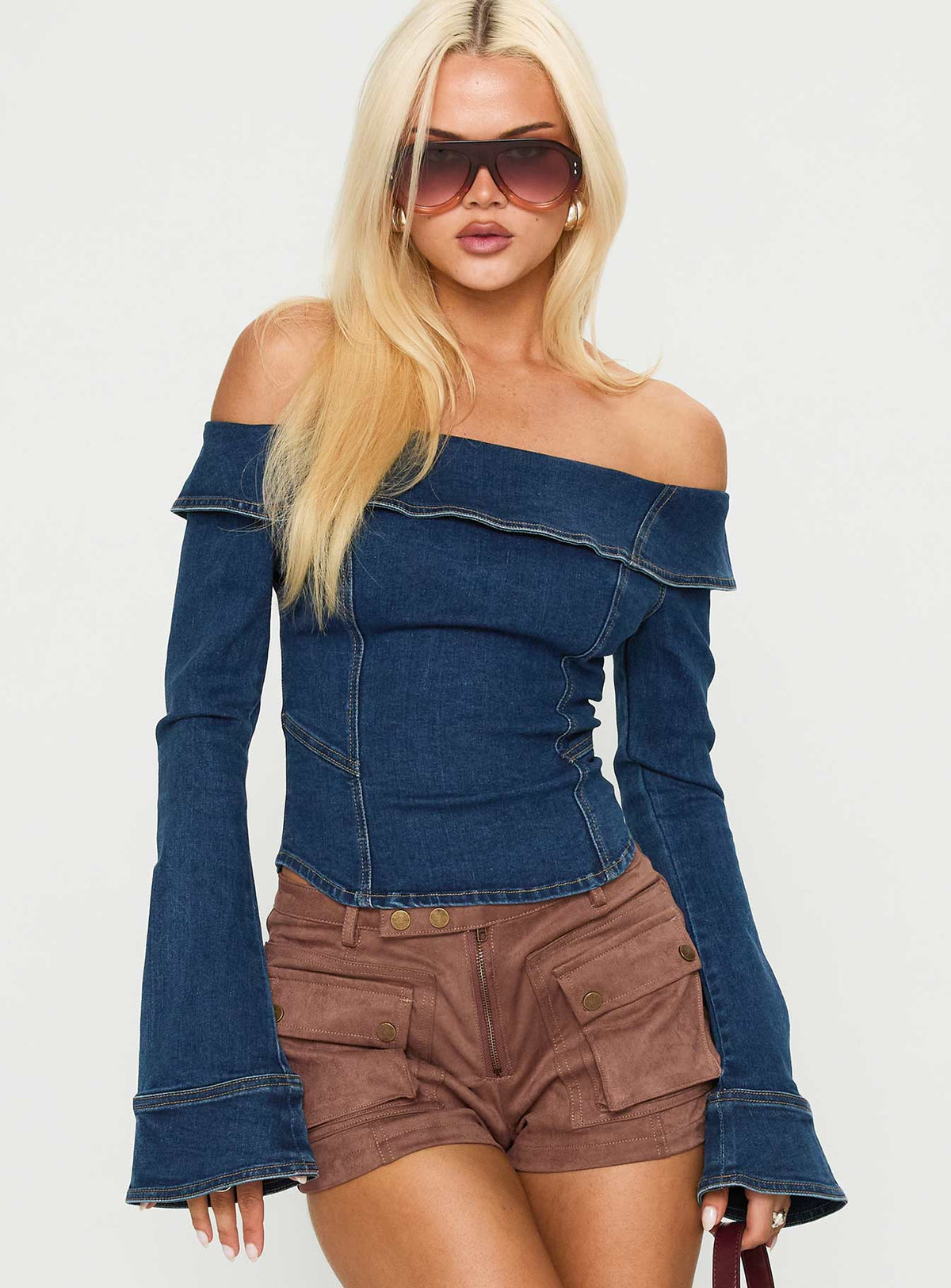 front view of model wearing Princess Polly In The Crowd Off Shoulder Top Dark Denim Full Sleeves straight 