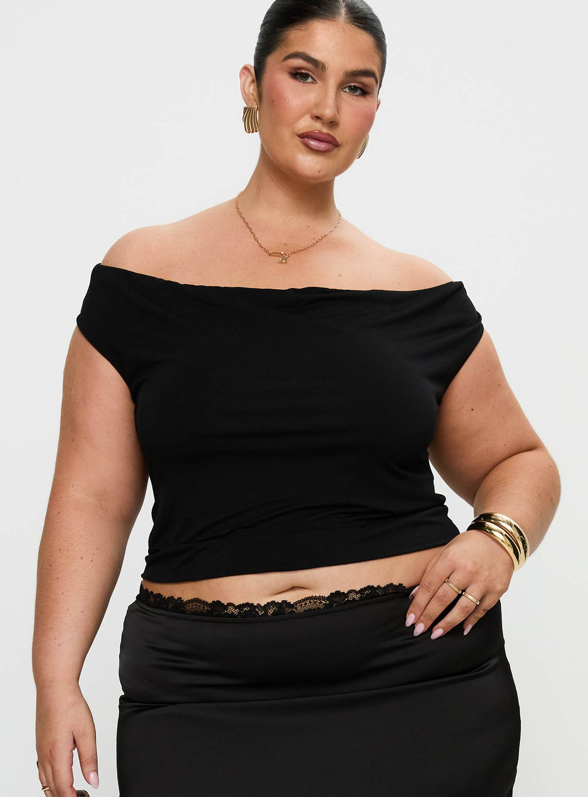 front view of model wearing Princess Polly Irina Multi-wear Top Black Curve Short Sleeves straight 
