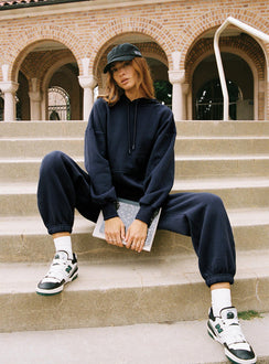 front view of model wearing Princess Polly Dream Fleece Classic Hoodie Navy Longline Jumpers Jumpers 