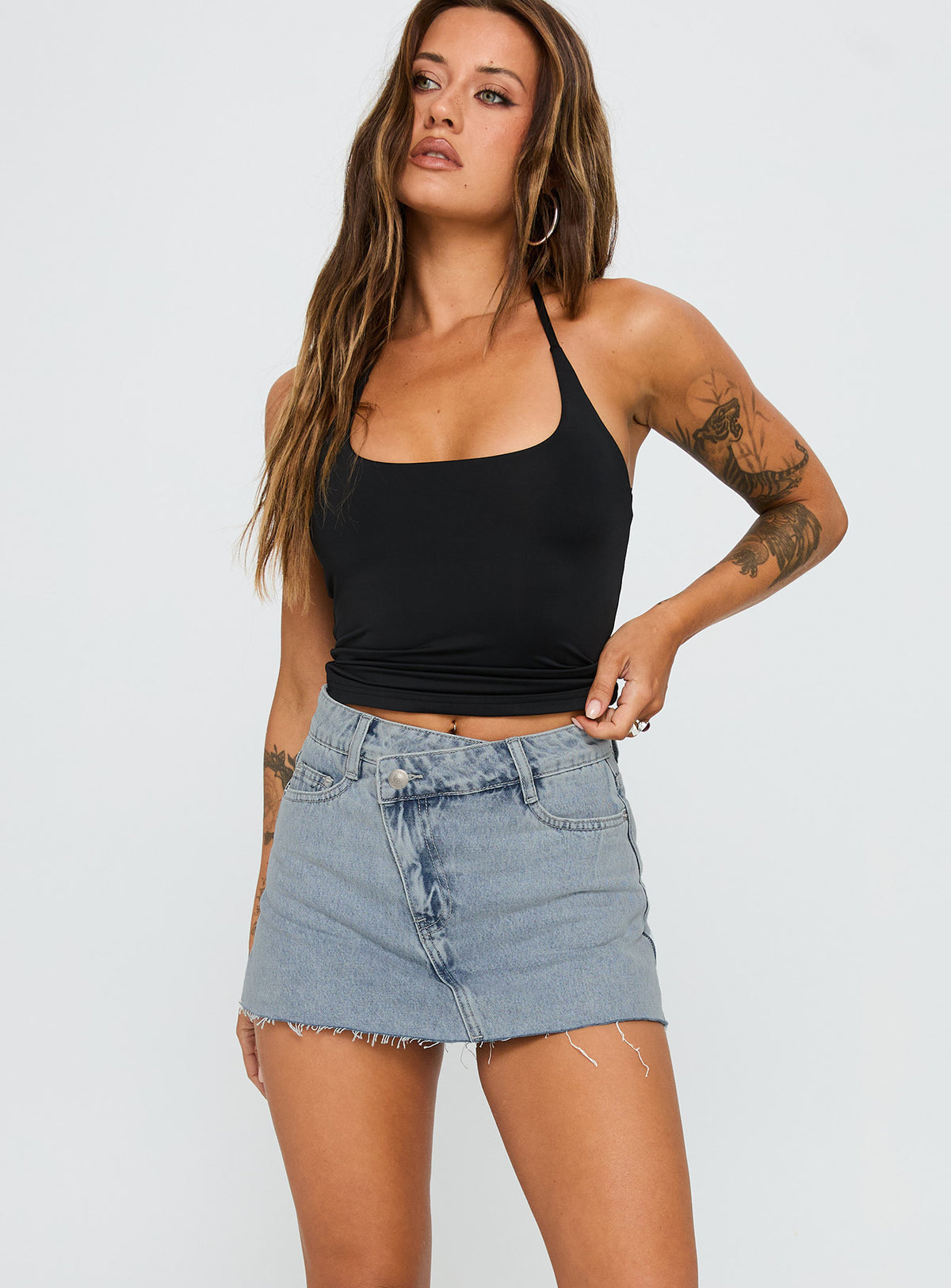 front view of model wearing Princess Polly Make My Day Mid Rise Denim Skort Light Wash High Waisted Shorts 