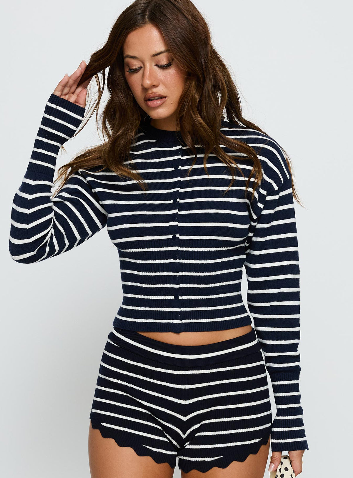 front view of model wearing Princess Polly Head In The Clouds Cardigan Navy Stripe Cropped Jumpers Jumpers 