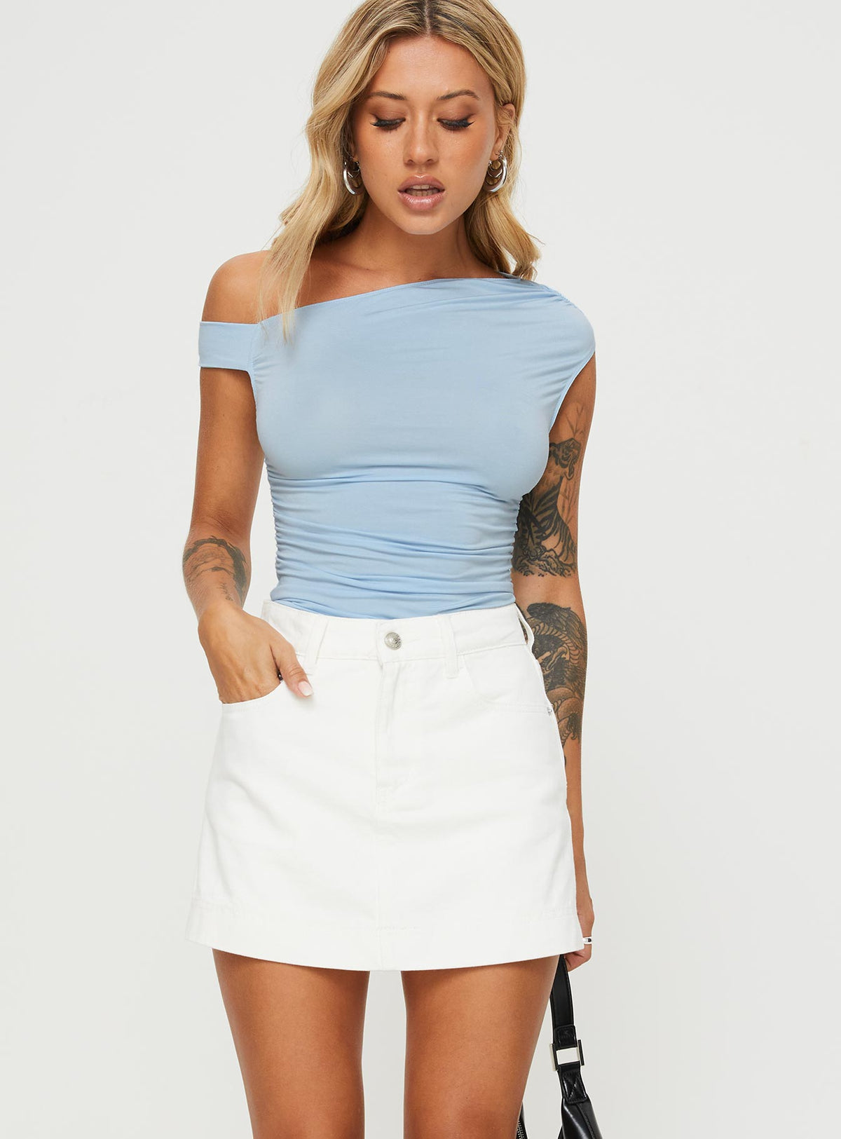 front view of model wearing Princess Polly Heuston Denim Skort White Denim High Waisted Shorts 