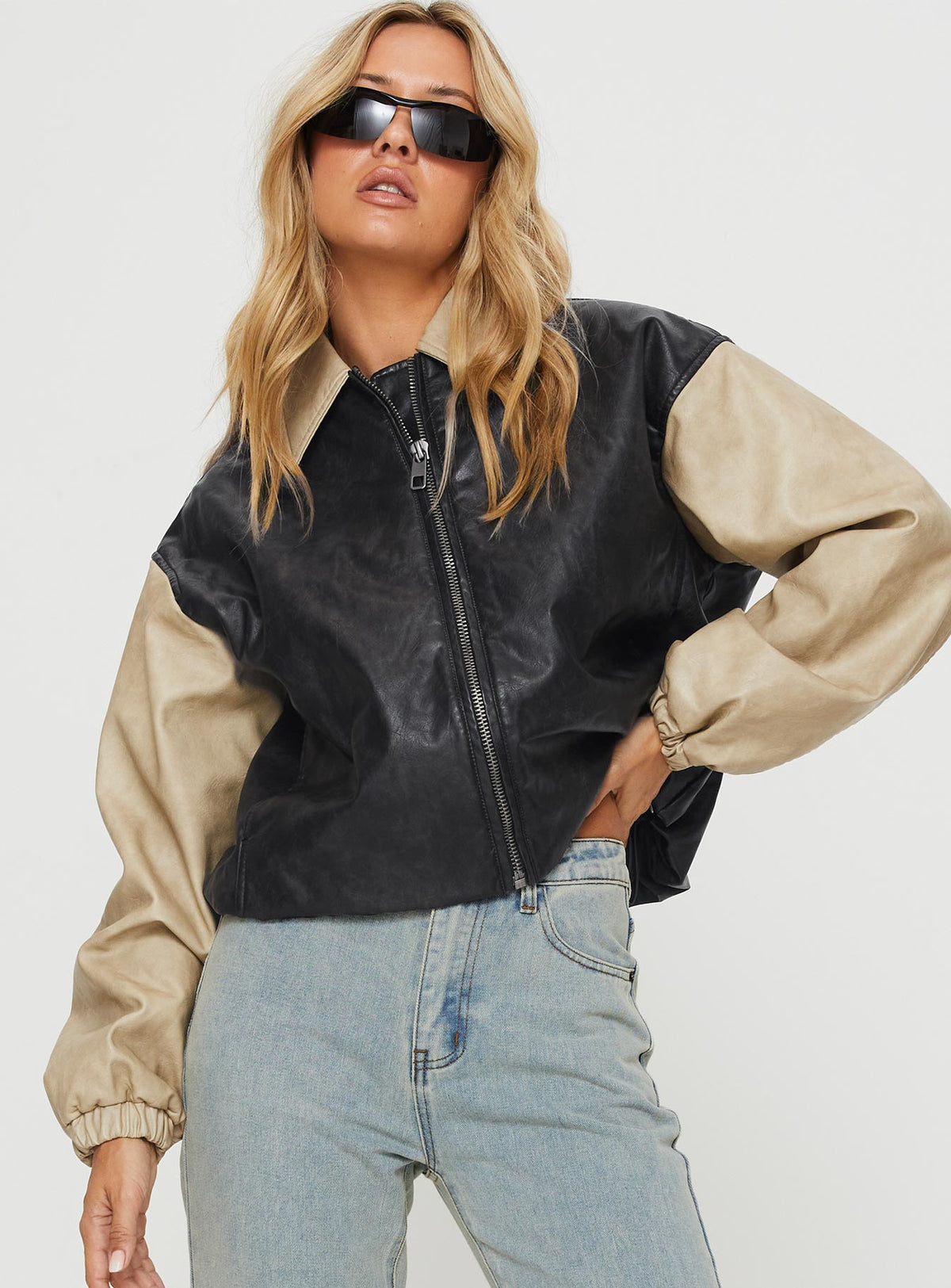 Faux leather bomber jacket Classic collar, drop shoulder, twin hip pockets, elasticated cuffs, drawstring toggle waist, zip fastening down front
