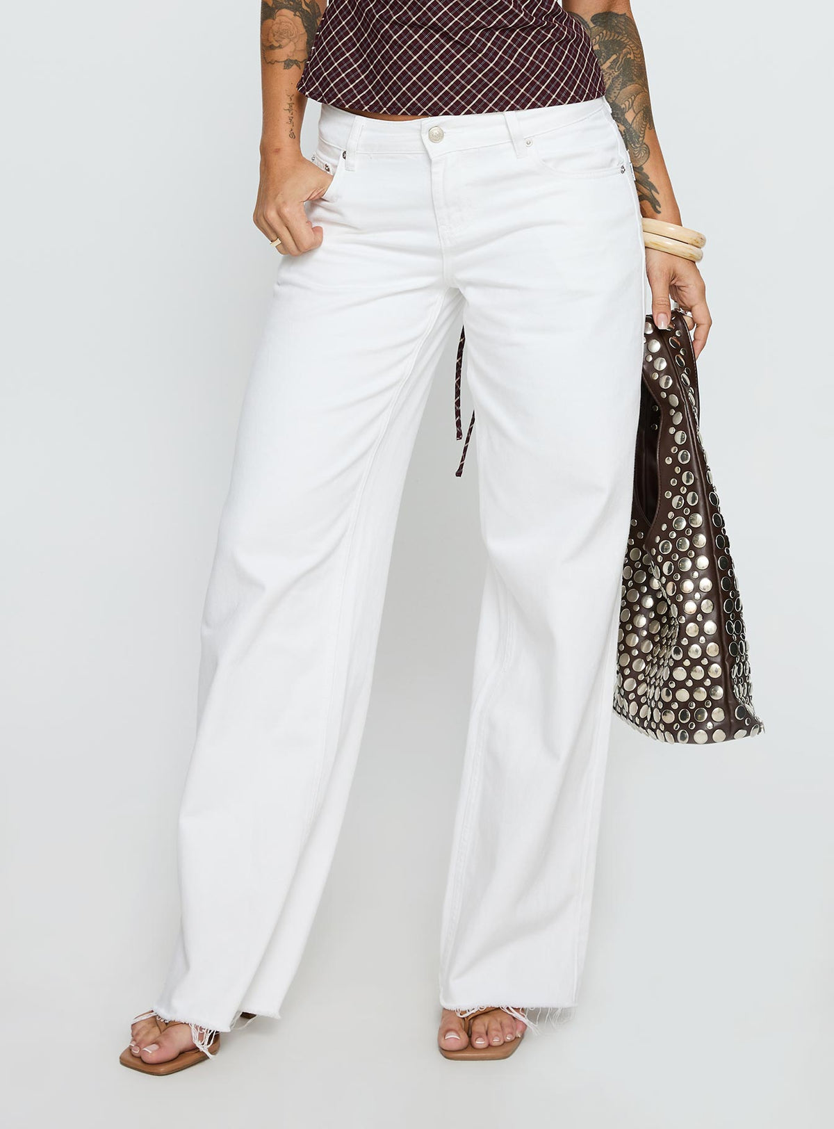 front view of model wearing Princess Polly Sabryna Low Rise Straight Leg Jeans White Low Rise Jeans Jeans 