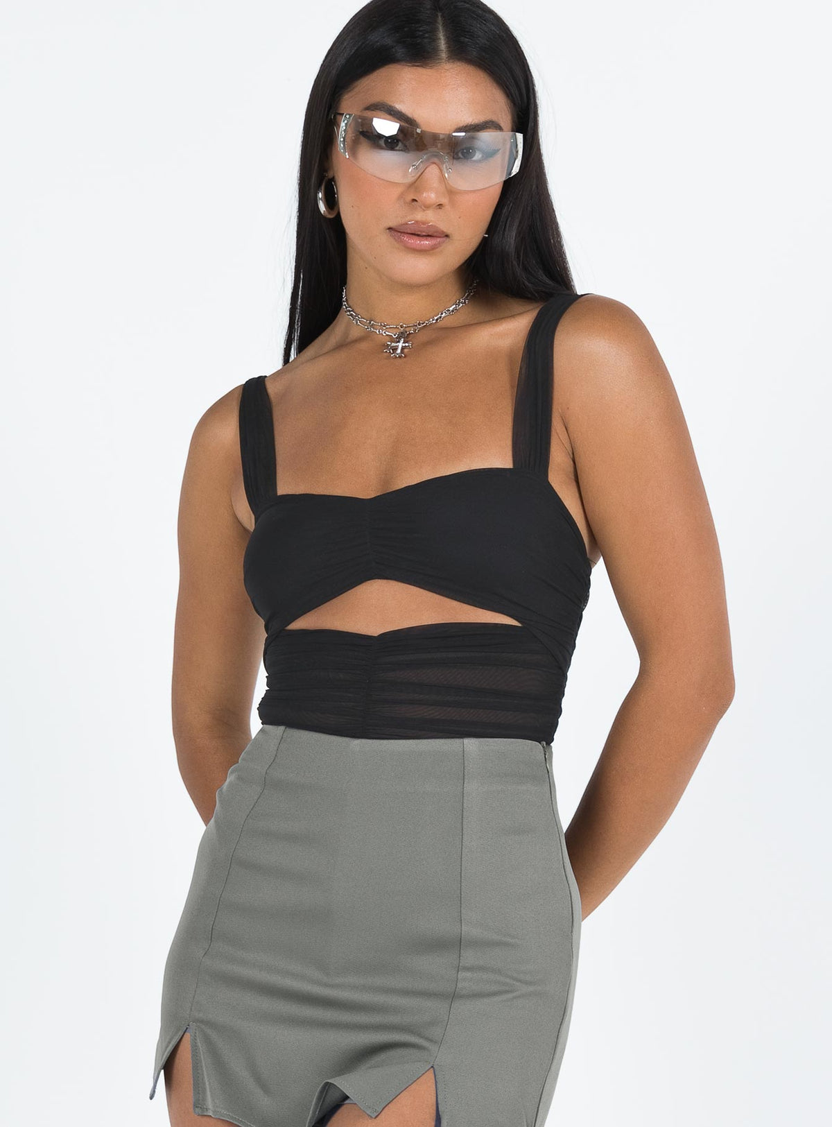 side view of model wearing Princess Polly Kalmia Bodysuit Black Sleeveless Bodysuit 