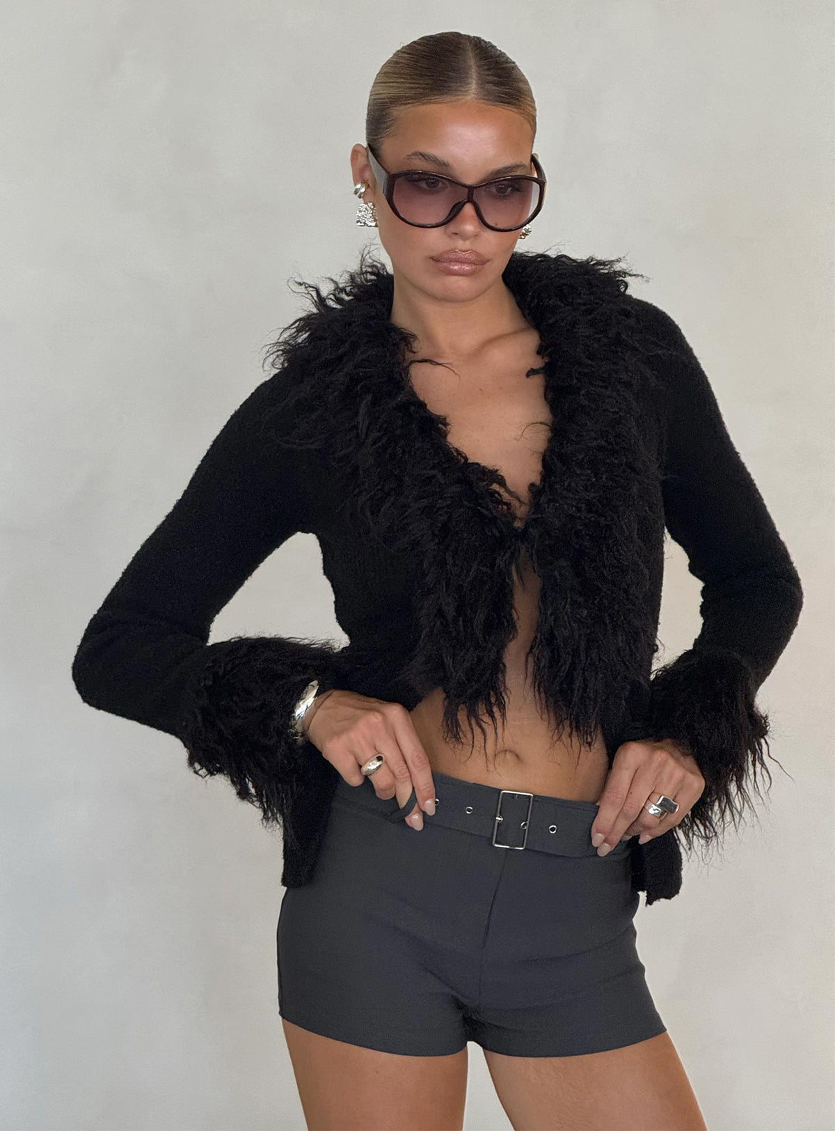 front view of model wearing Princess Polly Sistine Cardigan Black Longline Jumpers Jumpers 