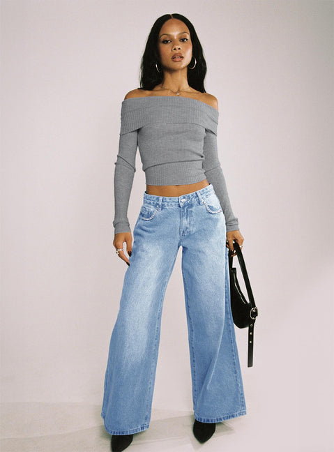 side view of model wearing Princess Polly Pearlisle Low Rise Baggy Jeans Light Wash Low Rise Jeans Jeans 