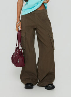 Featuring the Scarletta Ultra Wide Elasticated Waist Cargo Pants Khaki in womens regular pants with high-rise back view of model wearing Princess Polly