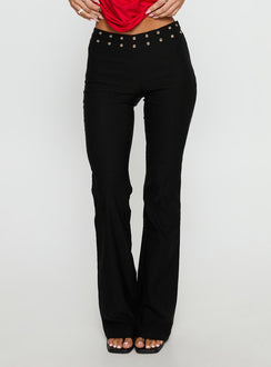 side view of model wearing Princess Polly Yevina Eyelet Flare Pant Black Low Rise Pants Pants 