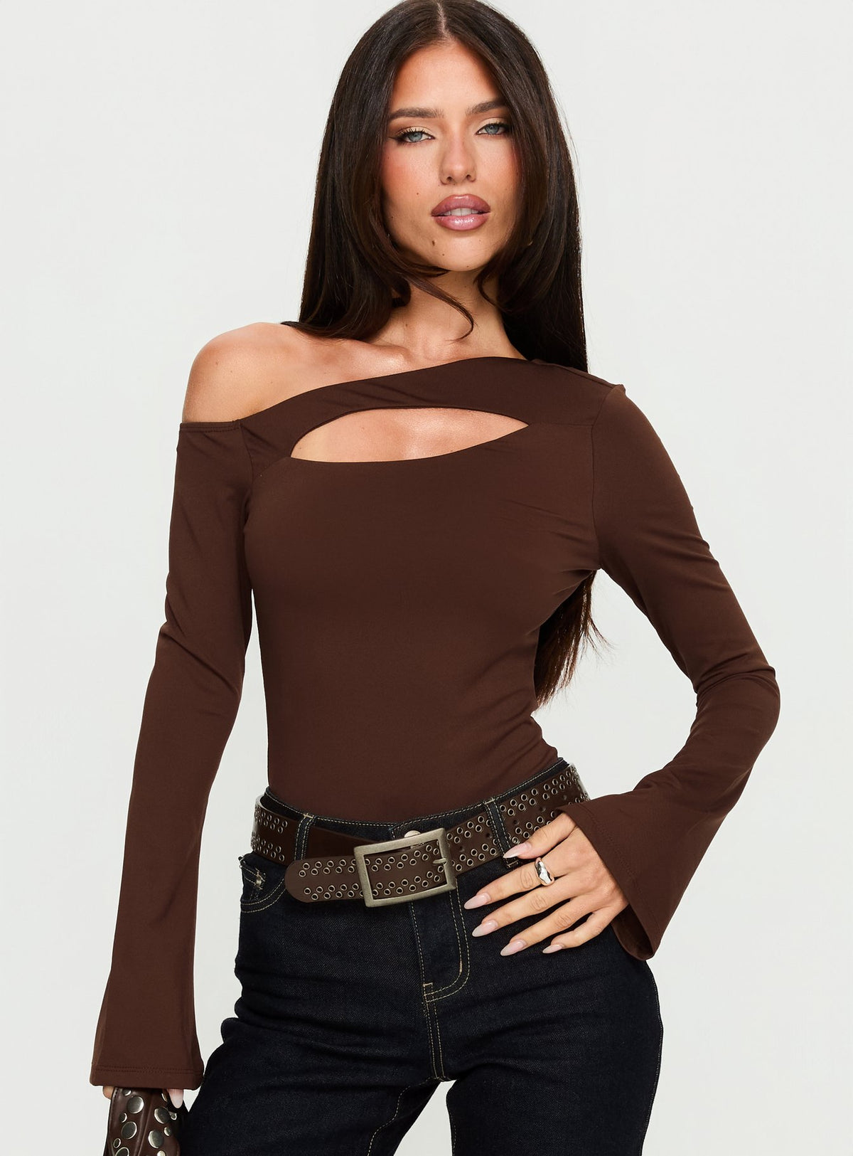 front view of model wearing Princess Polly Raissa Cut Out One Shoulder Bodysuit Brown Long Sleeve Tops Bodysuit 