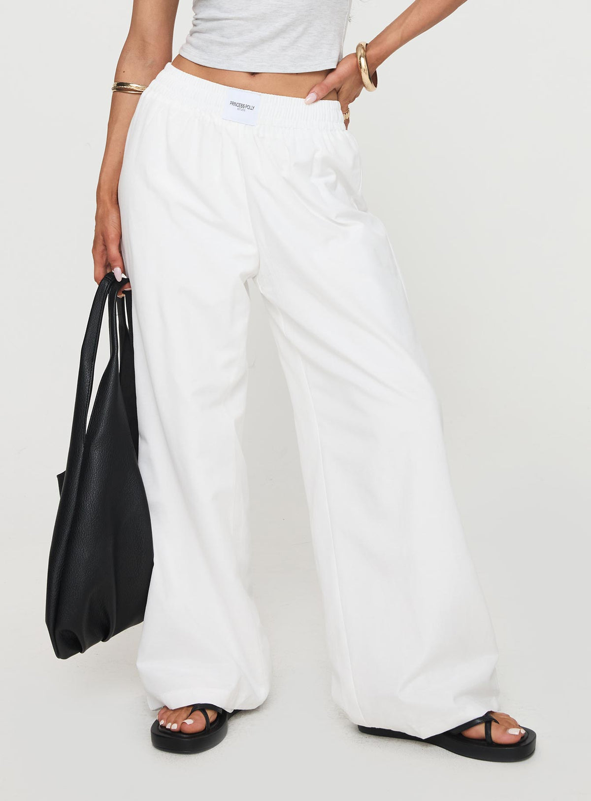 side view of model wearing Princess Polly Beach House Pants White Tall High Rise Pants Pants 