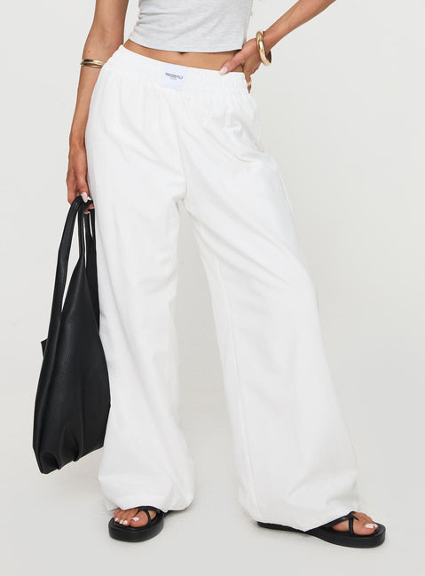 side view of model wearing Princess Polly Beach House Pants White Tall High Rise Pants Pants 